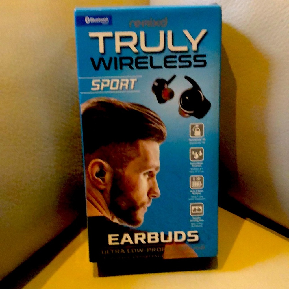 Brand new, still in the box, ReTrack truly wireless earbuds.